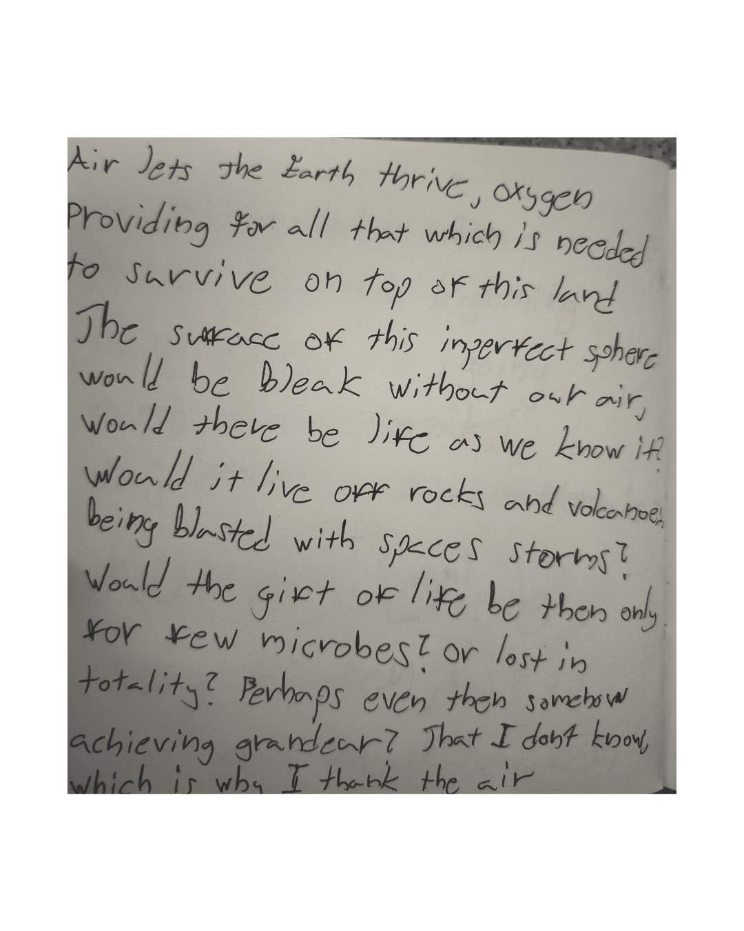 A photographed handwritten English poem reflecting on air, Earth, and life.